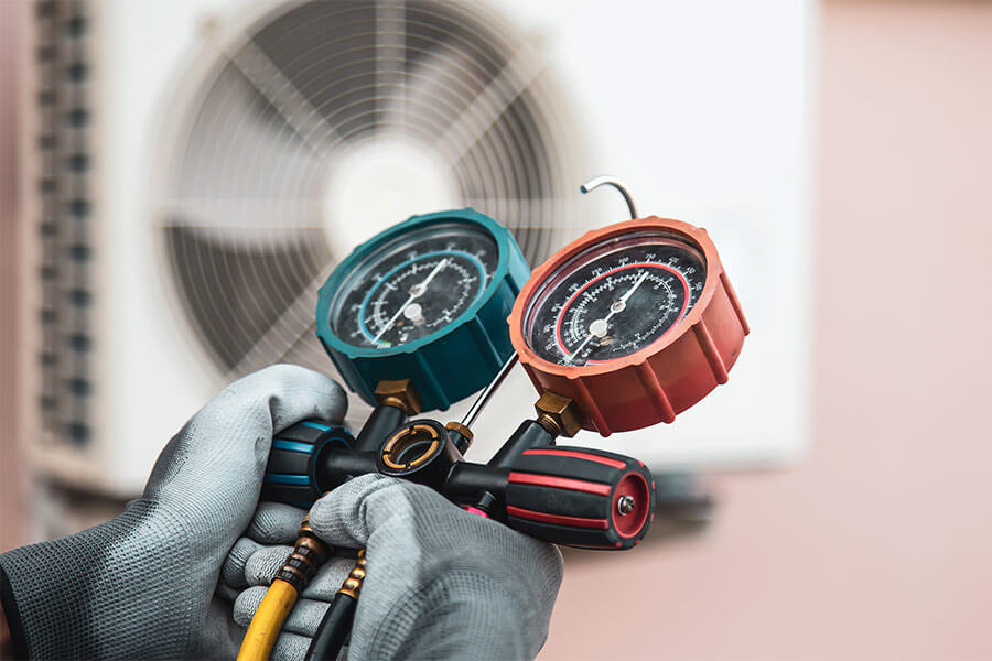 AC refrigerant leak repair in Oxford MS using pressure gauges