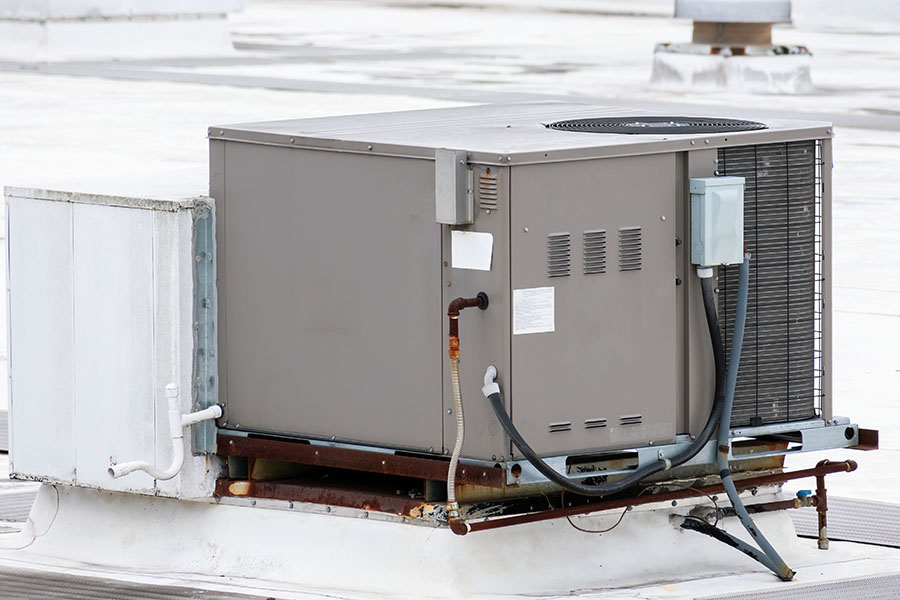 Rooftop commercial HVAC unit installation on building in Oxford MS