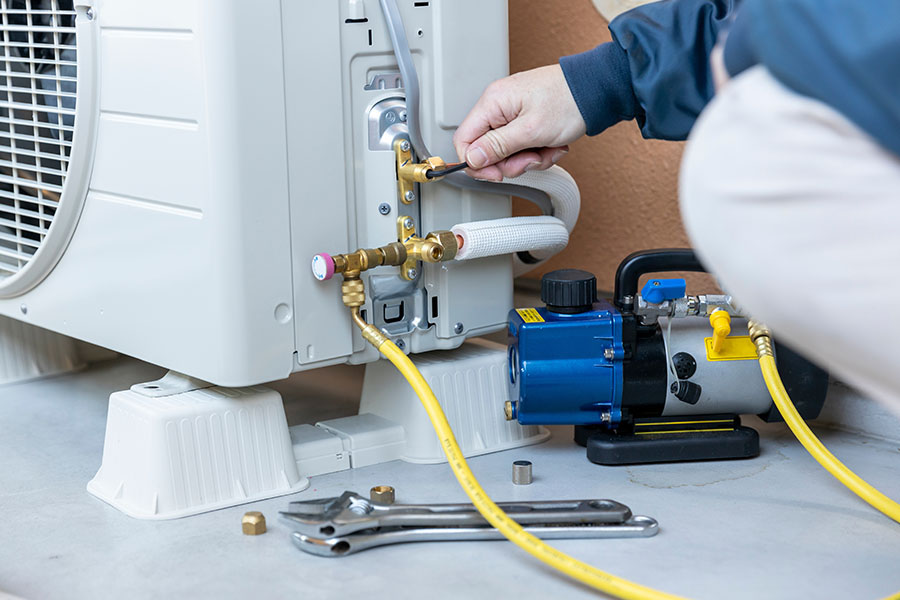 AC maintenance service on outdoor condenser unit in Oxford MS